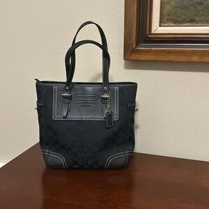 Coach black “Coach” print buckle bag